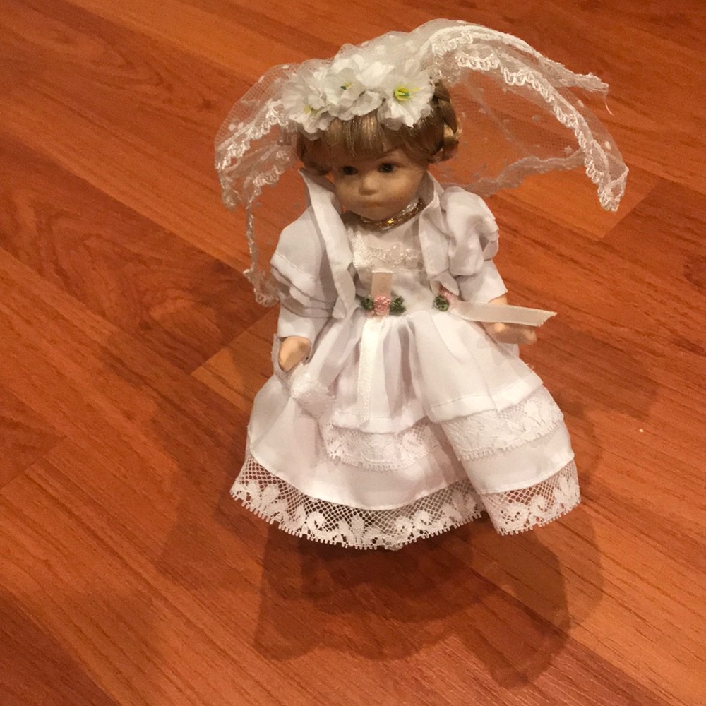 Porcelain doll 7.5”